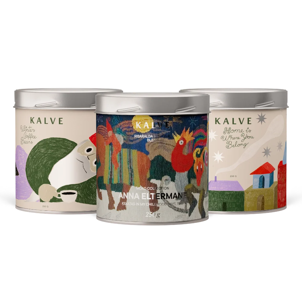 Three Kalve coffee tins with colorful designs on a white background