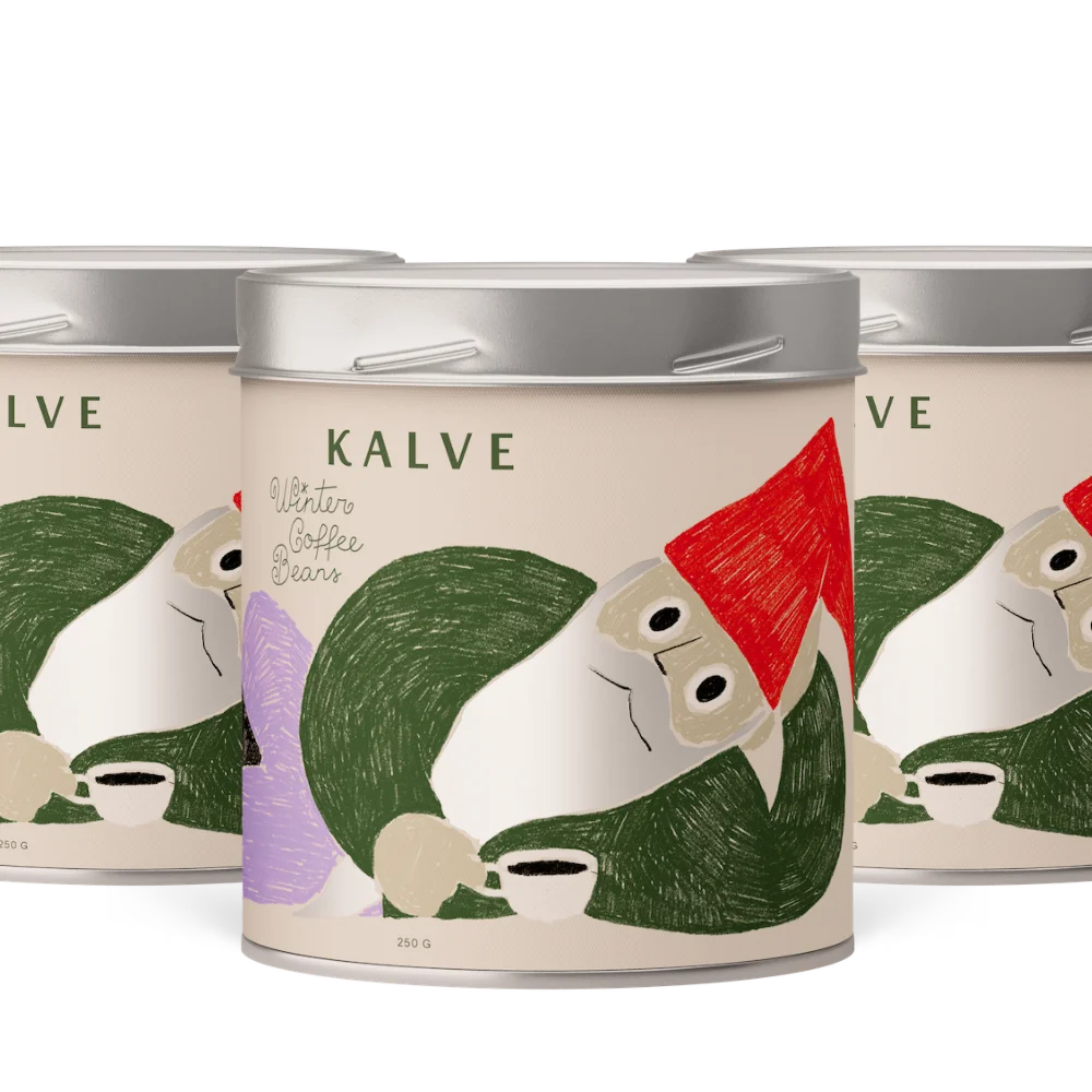 Three 'Kalve' coffee tins with cartoon squirrel design on a white background