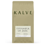 Coffee bean package labeled 'Kalve Colombia La Joya' on a white background