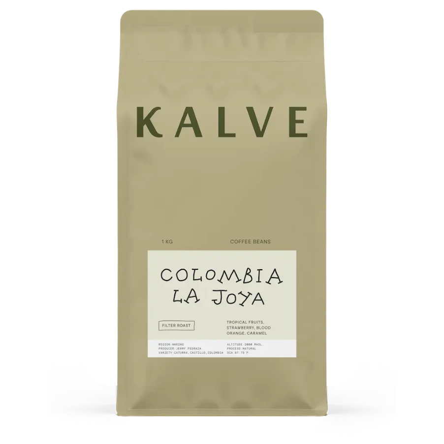 Coffee bean package labeled 'Kalve Colombia La Joya' on a white background