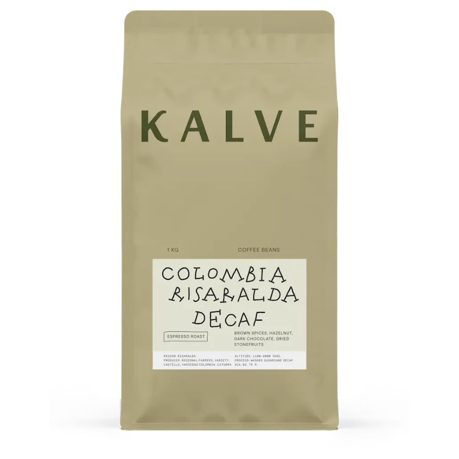Coffee bag labeled 'Kalve' with 'Colombia Bisaralda Decaf' on a white background