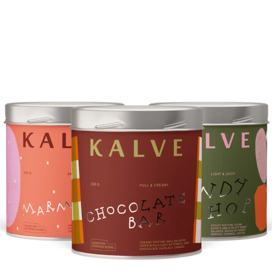 Three Kalve signature espresso tins in different flavors on a white background