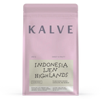 Pink coffee package with 'Kalve' branding and text on a white background