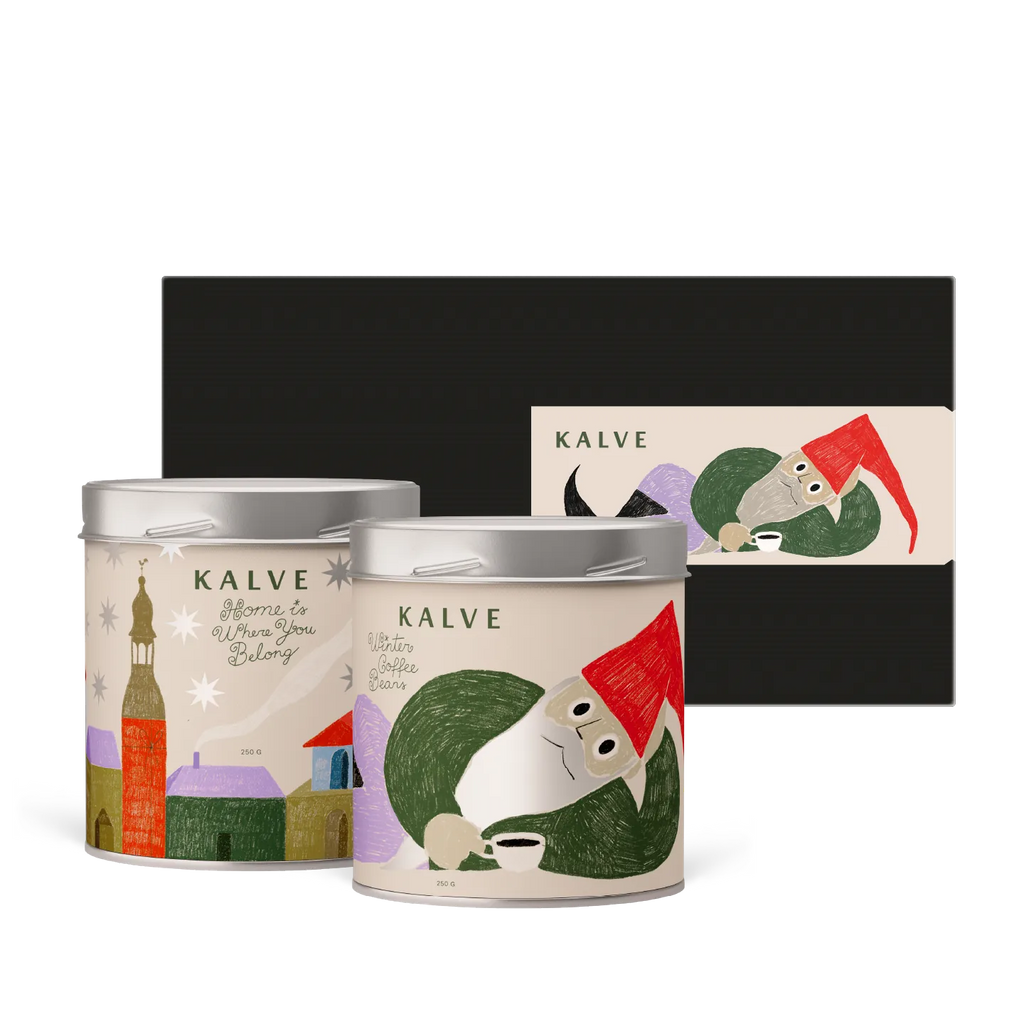 Two Kalve-themed tins with a decorative box on a white background