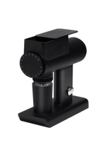 Black coffee grinder on a white background