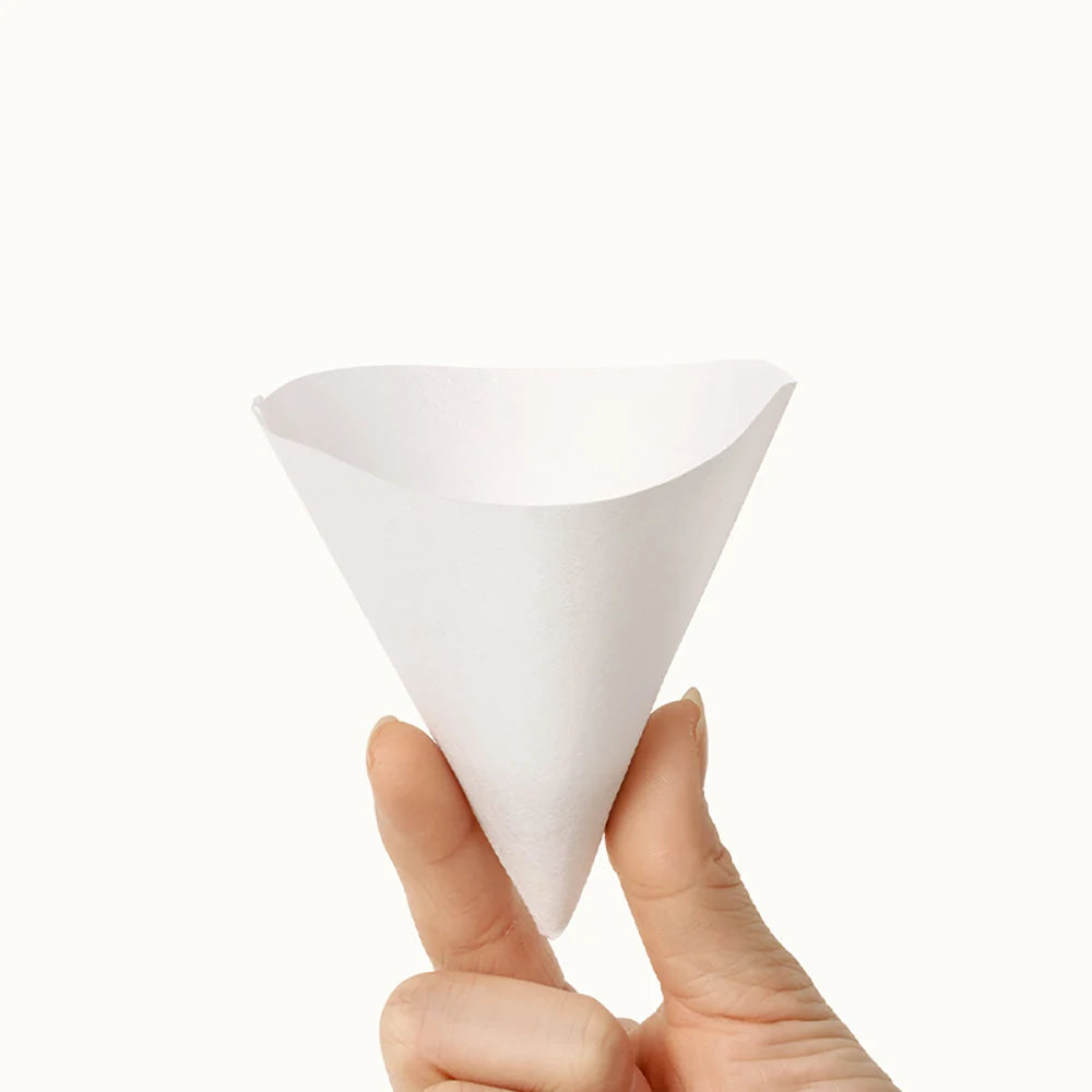 V02 coffee paper filters in scale