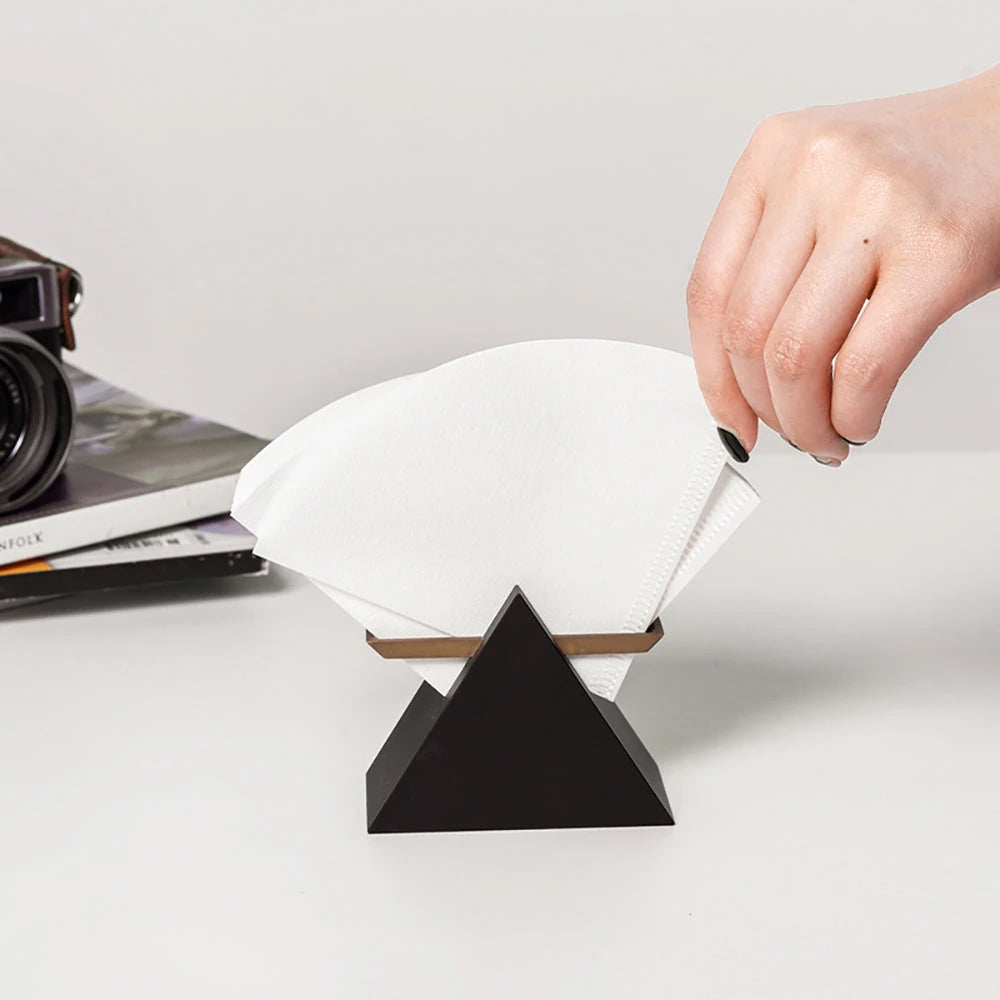 V02 paper coffee filters in a stand